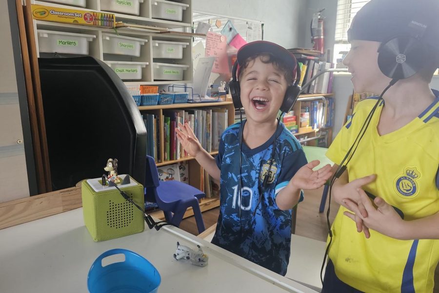 Two Gan Katan children laughing